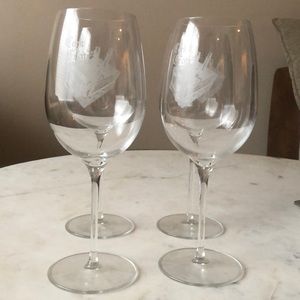 Set of four glass wine glasses